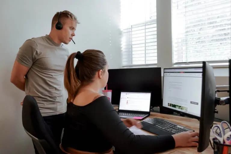 Fluid22 web designers working on development